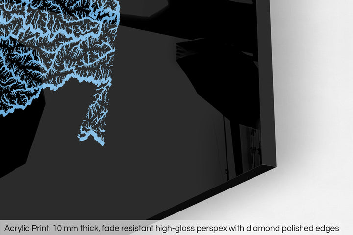 Closeup of an acrylic panel's corner, the details of a Grasshopper Geography map is visible. The text at the bottom reads: Acrylic print - 10 mm thick, fade reistant high-gloss perspex with diamond polished edges.