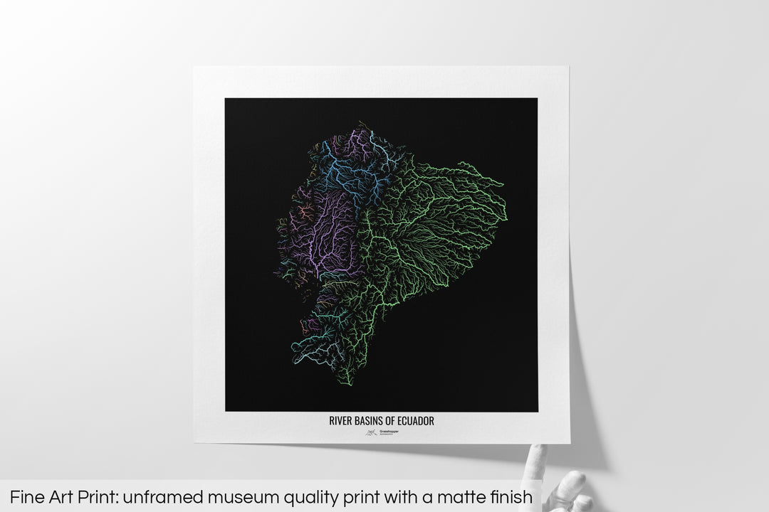 Unframed fine art print of a colourful map with a thick white mat. The title of the map and the Grasshopper Geography logo is printed on the mat, below the image. The map print lies flat on a white surface, a hand holding up one of the corners. The bottom text reads: Fine art print - unframed museum quality print with a matte finish.