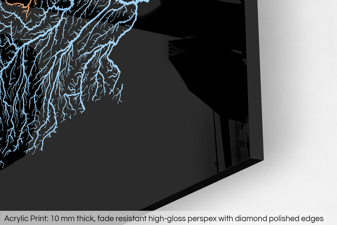 Closeup of an acrylic panel's corner, the details of a Grasshopper Geography map is visible. The text at the bottom reads: Acrylic print - 10 mm thick, fade reistant high-gloss perspex with diamond polished edges.