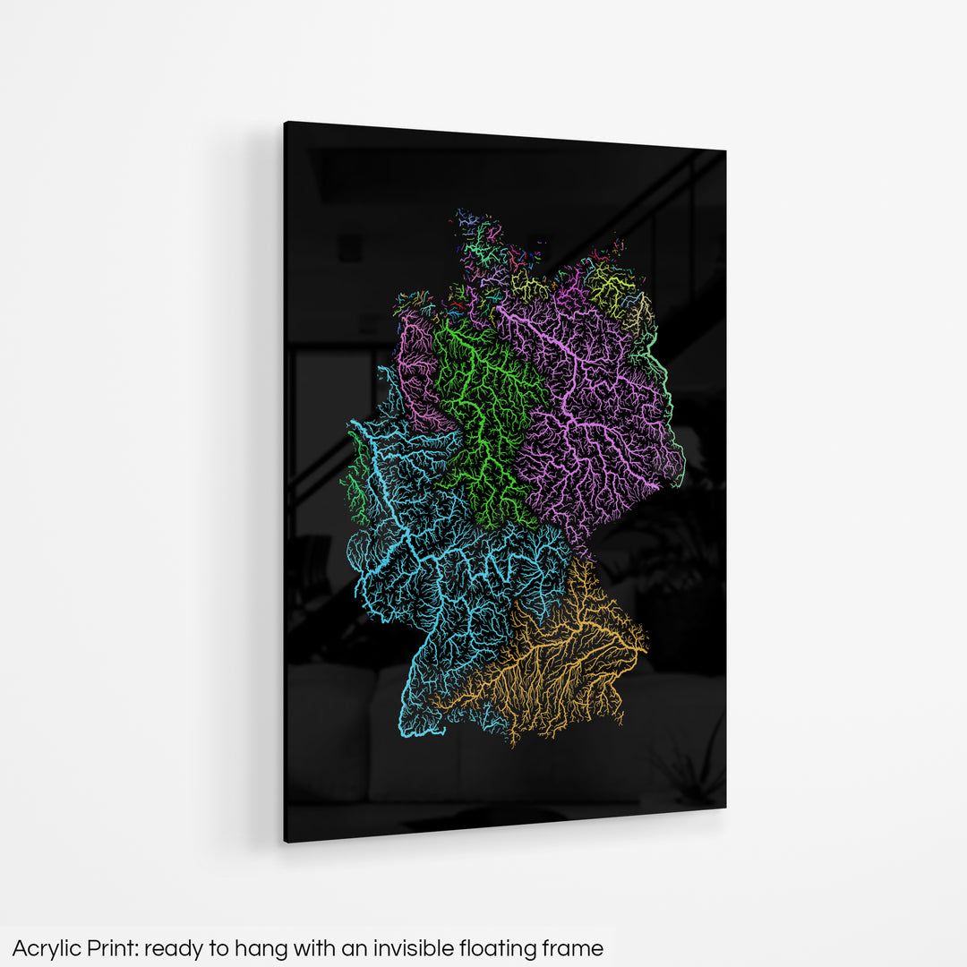 A colourful Grasshopper Geography map hanging on a white wall. The text at the bottom reads: Acrylic print - ready to hang with an invisible floating frame.