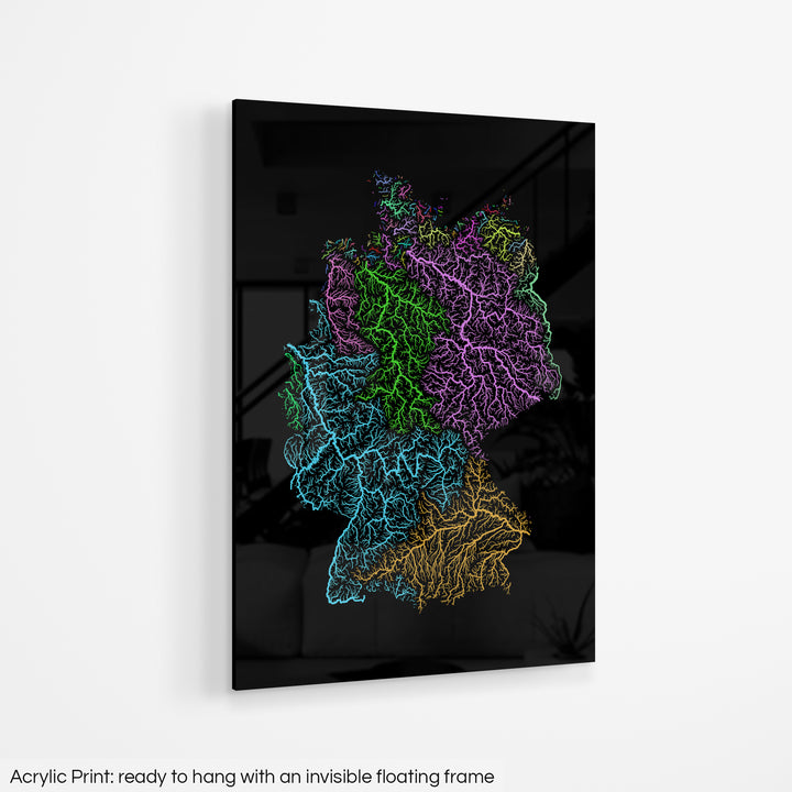 A colourful Grasshopper Geography map hanging on a white wall. The text at the bottom reads: Acrylic print - ready to hang with an invisible floating frame.