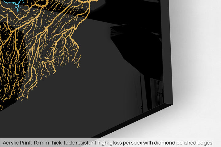 Closeup of an acrylic panel's corner, the details of a Grasshopper Geography map is visible. The text at the bottom reads: Acrylic print - 10 mm thick, fade reistant high-gloss perspex with diamond polished edges.