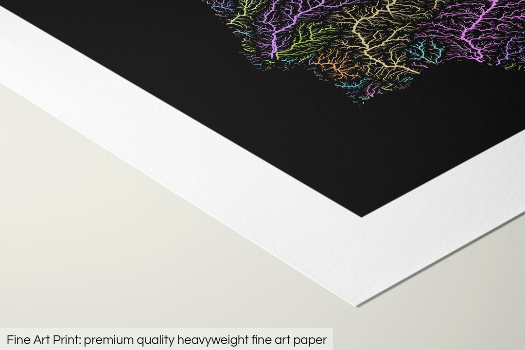 Closeup of a fine art print's corner lying on a flat surface, the details of a Grasshopper Geography map is visible. The text at the bottom reads: Fine art print - premium quality heavyweight fine art paper.