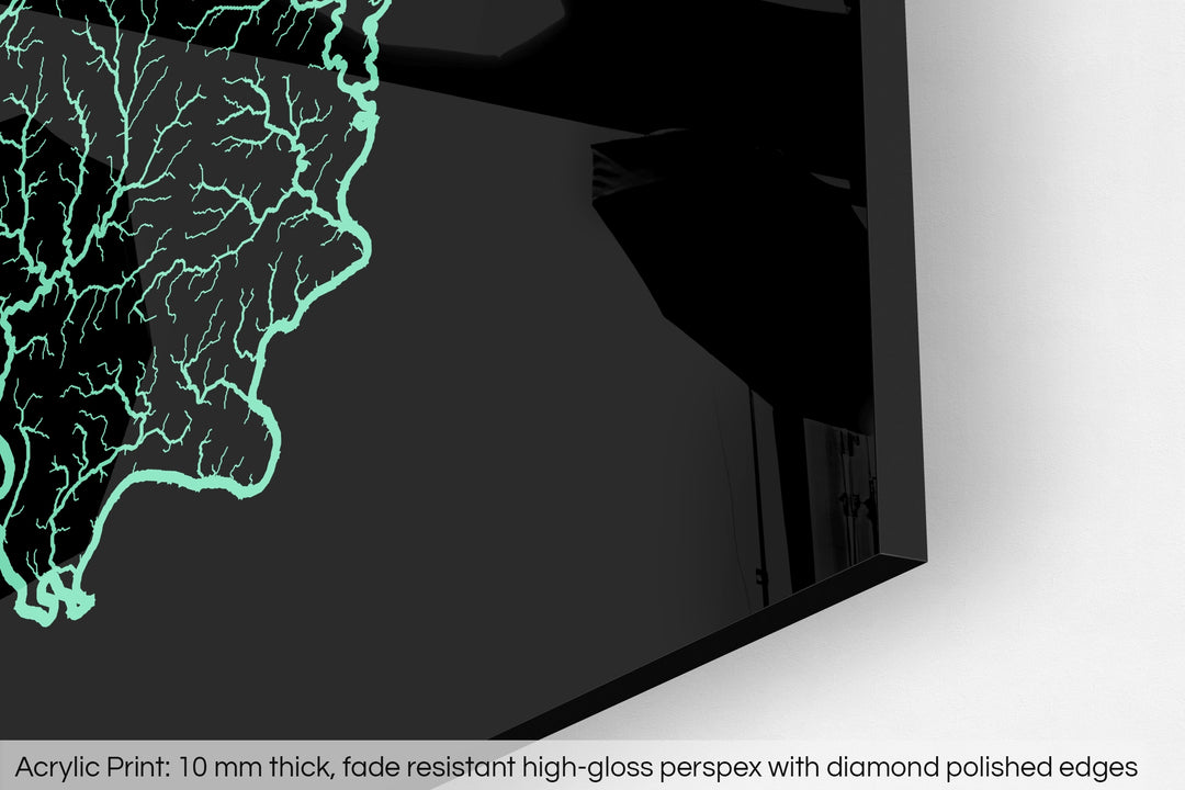 Closeup of an acrylic panel's corner, the details of a Grasshopper Geography map is visible. The text at the bottom reads: Acrylic print - 10 mm thick, fade reistant high-gloss perspex with diamond polished edges.