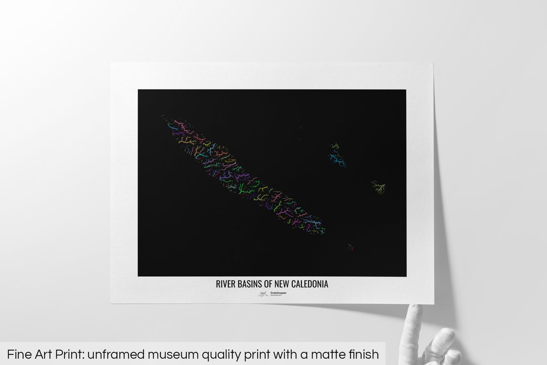 Unframed fine art print of a colourful map with a thick white mat. The title of the map and the Grasshopper Geography logo is printed on the mat, below the image. The map print lies flat on a white surface, a hand holding up one of the corners. The bottom text reads: Fine art print - unframed museum quality print with a matte finish.