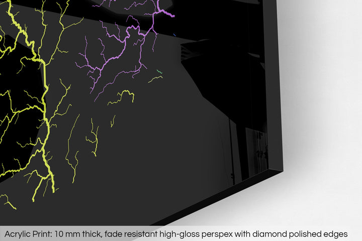 Closeup of an acrylic panel's corner, the details of a Grasshopper Geography map is visible. The text at the bottom reads: Acrylic print - 10 mm thick, fade reistant high-gloss perspex with diamond polished edges.