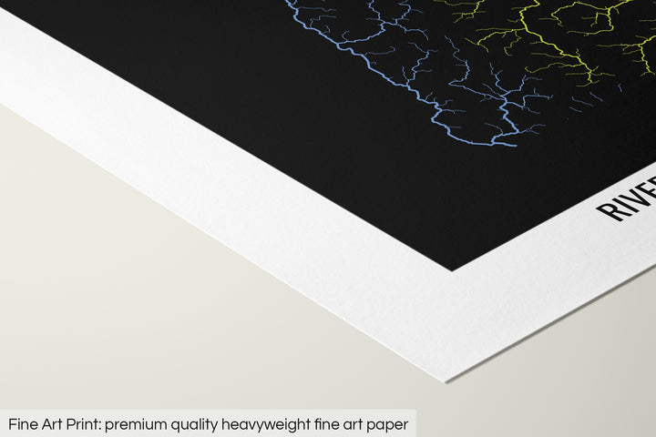 Closeup of a fine art print's corner lying on a flat surface, the details of a Grasshopper Geography map is visible. The text at the bottom reads: Fine art print - premium quality heavyweight fine art paper.