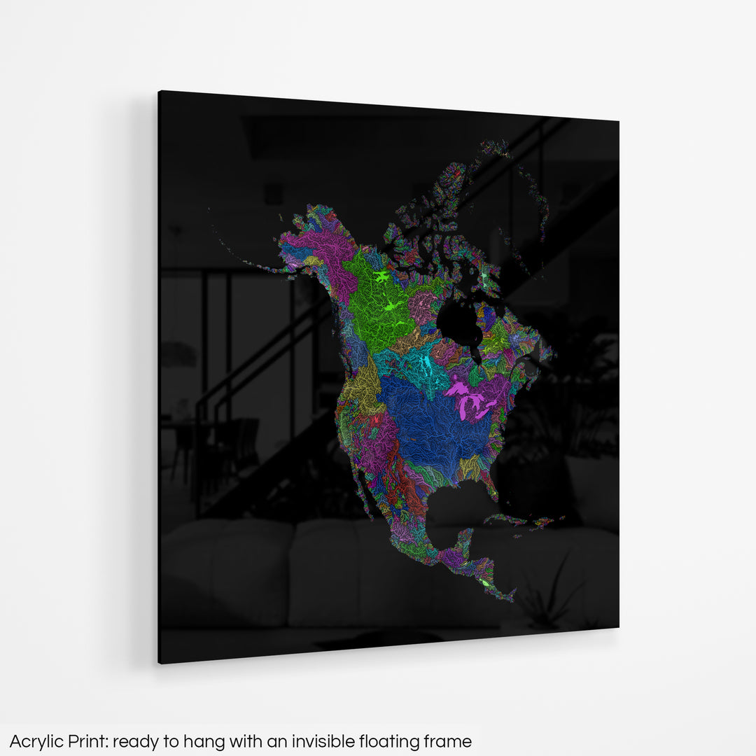 A colourful Grasshopper Geography map hanging on a white wall. The text at the bottom reads: Acrylic print - ready to hang with an invisible floating frame.