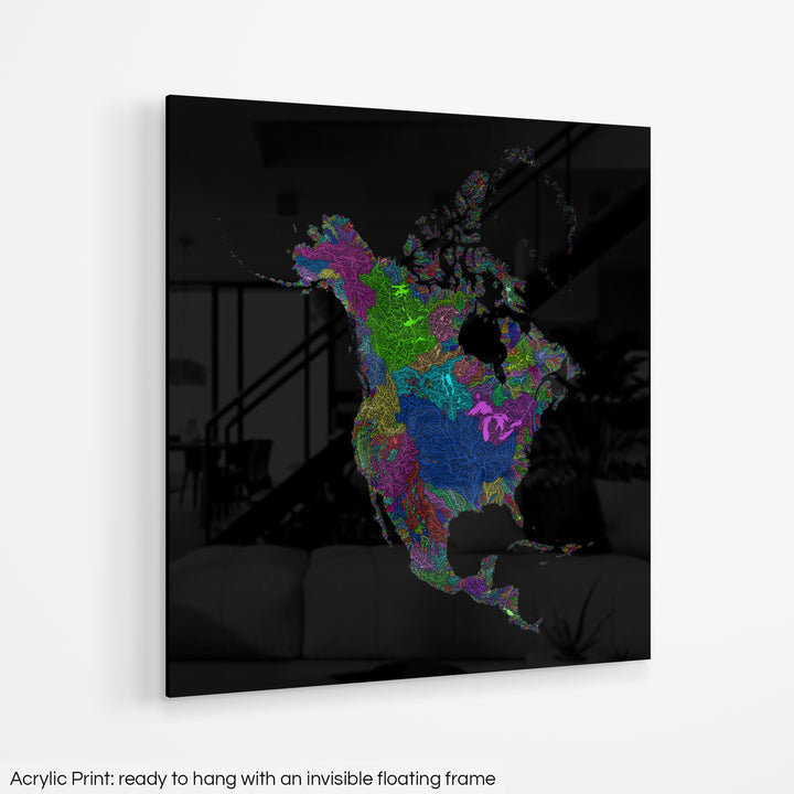A colourful Grasshopper Geography map hanging on a white wall. The text at the bottom reads: Acrylic print - ready to hang with an invisible floating frame.