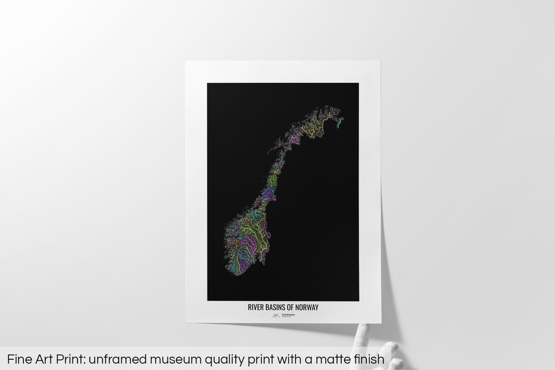 Unframed fine art print of a colourful map with a thick white mat. The title of the map and the Grasshopper Geography logo is printed on the mat, below the image. The map print lies flat on a white surface, a hand holding up one of the corners. The bottom text reads: Fine art print - unframed museum quality print with a matte finish.