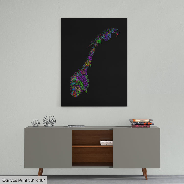 A colourful Grasshopper Geography map home decor in a living room, on a light grey wall. The map is printed on canvas and hangs above a modern low storage cabinet.