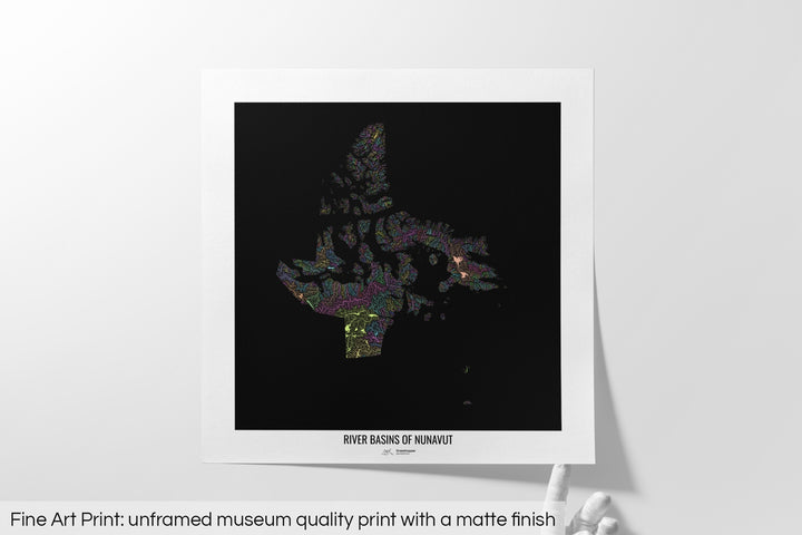 Unframed fine art print of a colourful map with a thick white mat. The title of the map and the Grasshopper Geography logo is printed on the mat, below the image. The map print lies flat on a white surface, a hand holding up one of the corners. The bottom text reads: Fine art print - unframed museum quality print with a matte finish.