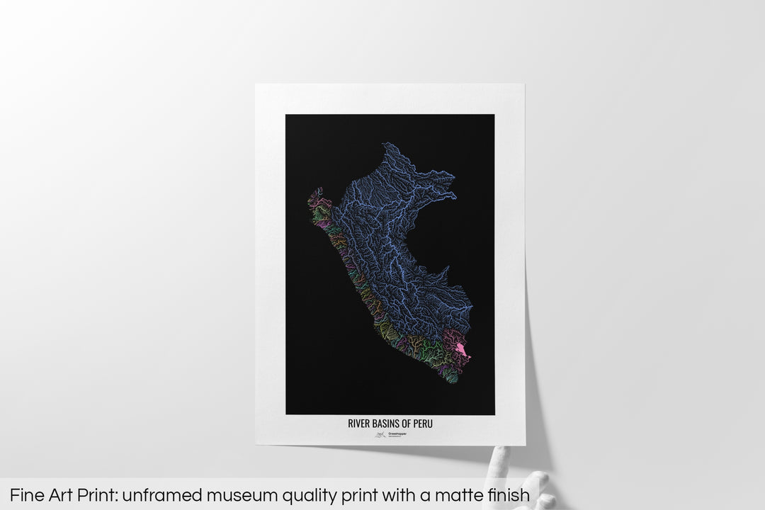 Unframed fine art print of a colourful map with a thick white mat. The title of the map and the Grasshopper Geography logo is printed on the mat, below the image. The map print lies flat on a white surface, a hand holding up one of the corners. The bottom text reads: Fine art print - unframed museum quality print with a matte finish.