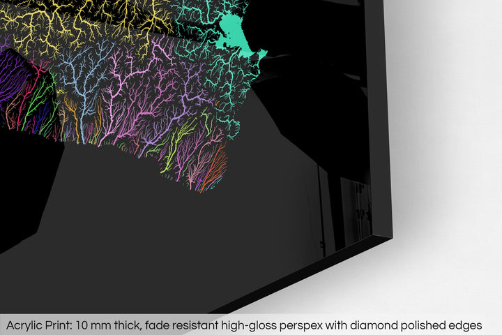 Closeup of an acrylic panel's corner, the details of a Grasshopper Geography map is visible. The text at the bottom reads: Acrylic print - 10 mm thick, fade reistant high-gloss perspex with diamond polished edges.