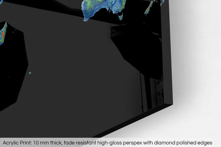 Closeup of an acrylic panel's corner, the details of a Grasshopper Geography map is visible. The text at the bottom reads: Acrylic print - 10 mm thick, fade reistant high-gloss perspex with diamond polished edges.