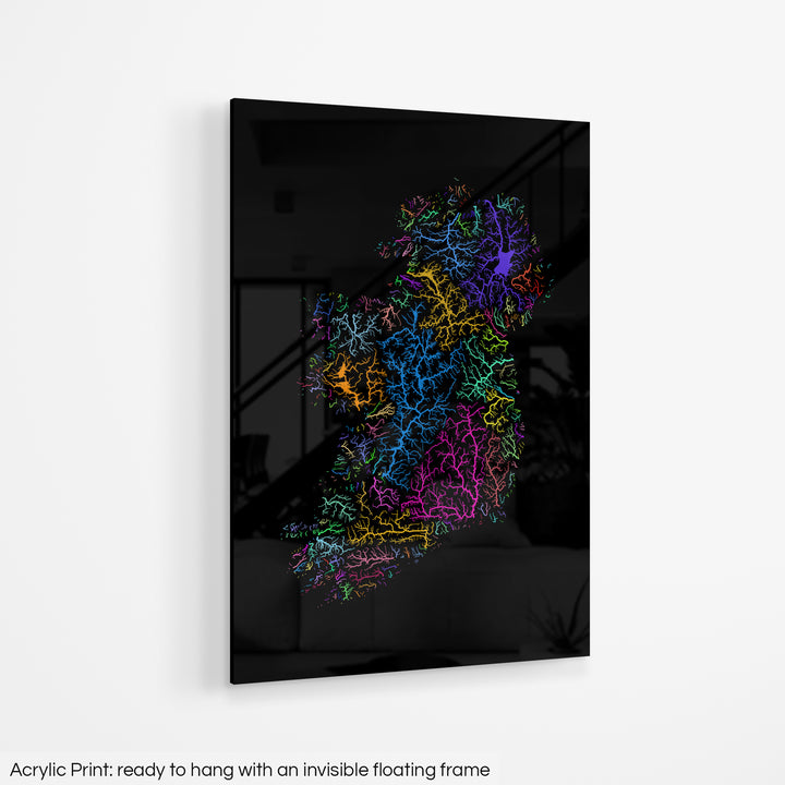 A colourful Grasshopper Geography map hanging on a white wall. The text at the bottom reads: Acrylic print - ready to hang with an invisible floating frame.