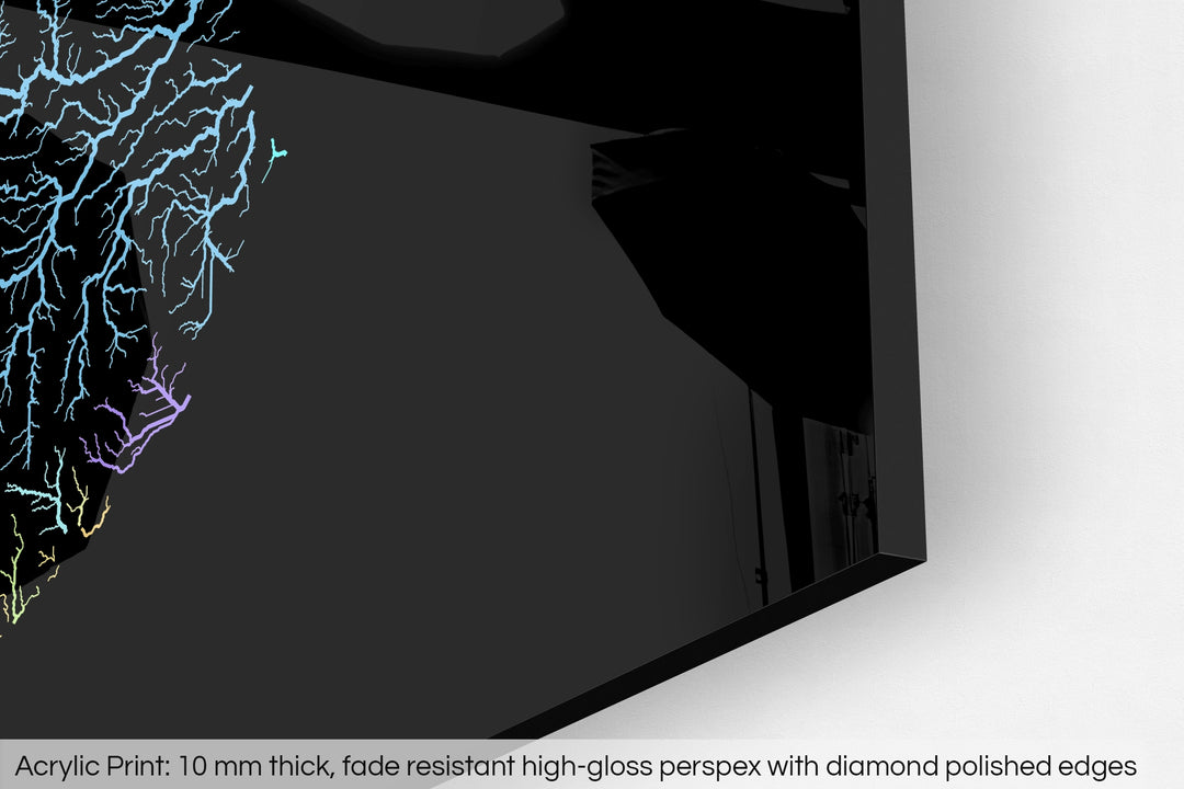 Closeup of an acrylic panel's corner, the details of a Grasshopper Geography map is visible. The text at the bottom reads: Acrylic print - 10 mm thick, fade reistant high-gloss perspex with diamond polished edges.
