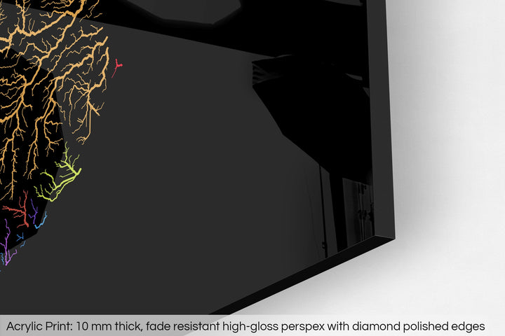 Closeup of an acrylic panel's corner, the details of a Grasshopper Geography map is visible. The text at the bottom reads: Acrylic print - 10 mm thick, fade reistant high-gloss perspex with diamond polished edges.